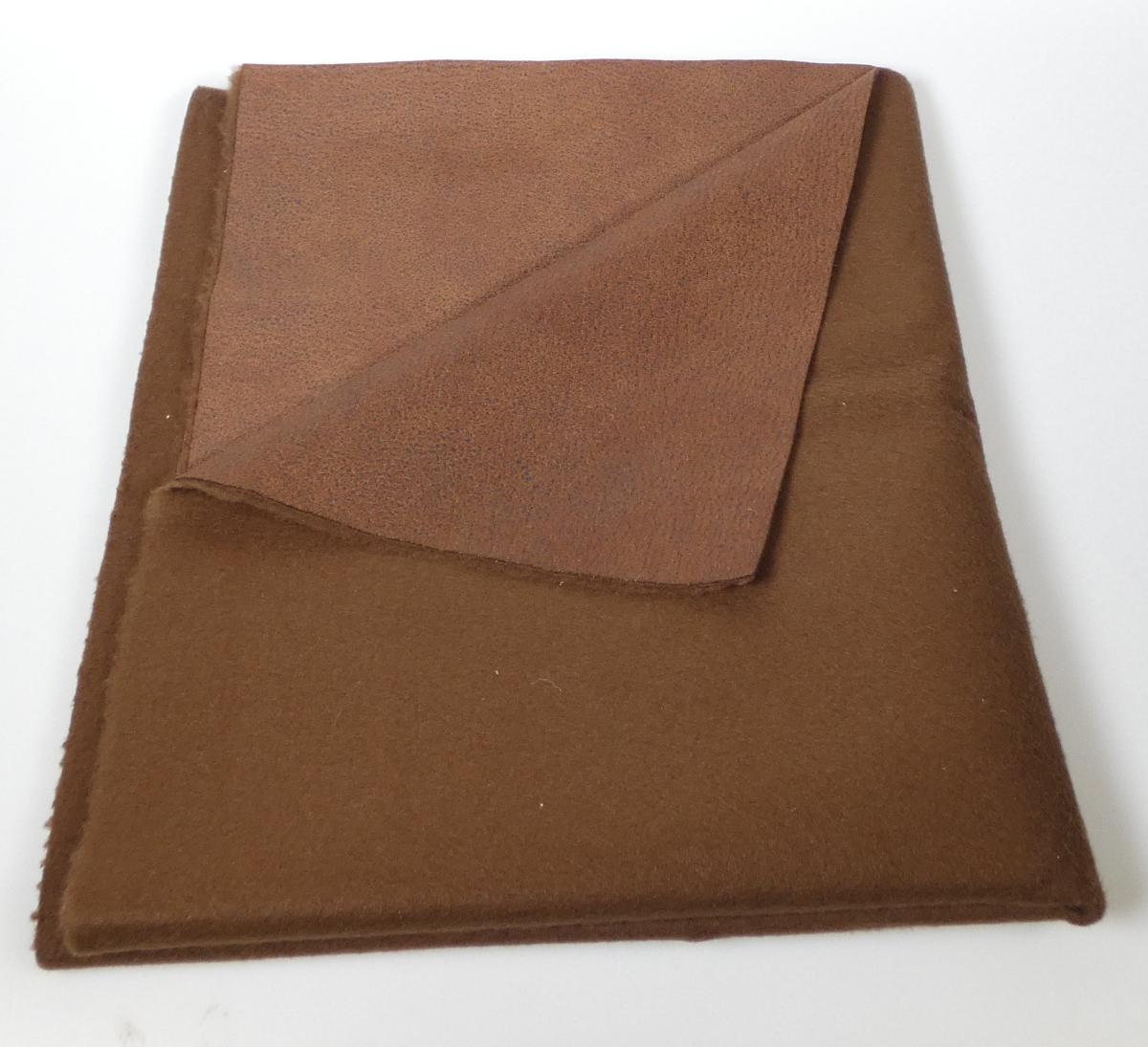 Textillaminat, Foto siehe Anlage,
- als Meterware, mit einer Breite von laut Antrag 142 cm,
- laut Untersuchungsergebnis:
-- aus zwei mit ihrer ganzen Fläche aufeinanderliegenden und so miteinander durch Kleben
   verbundenen Lagen:
--- mit einer Oberlage (Schauseite):
---- aus einem gerauten, geprägten und bedruckten Kettengewirke,
---- aus synthetischen Chemiefasern (laut Antrag Polyester),
---- keine Elastomergarne oder Kautschukfäden enthaltend,
---- kein Samt, Plüsch, Schlingengewirke oder Schlingengestricke,
--- mit einer Unterlage:
---- aus einem gerauten Kuliergewirke,
---- aus synthetischen Chemiefasern,
- das die Schauseite bildende Kettengewirke verleiht der Ware insbesondere im Hinblick auf
  die Verwendung als Möbelbezugsstoff ihren wesentlichen Charakter.

"Kettengewirke, anderes als solche der Positionen 6001 bis 6004, aus synthetischen Chemiefasern,
 anderes als in der Unterposition (HS) 6005 35 genannte, bedruckt"