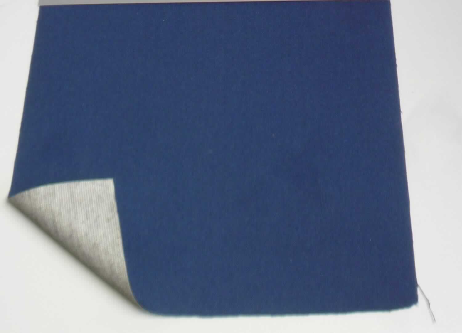 Textillaminat, sog. GORE-TEX(R) Textillaminat, Foto siehe Anlage,
- als Meterware, laut Antrag mit einer Breite von 142 cm,
- aus drei mit ihrer ganzen Fläche aufeinander liegenden und so miteinander durch Kleben verbundenen Lagen: 
-- mit einer Oberlage (Schauseite) aus einem einfarbigen Gewebe aus laut Antrag Nomex (synthetische 
   Chemiefasern),
-- mit einer Zwischenlage aus einer dünnen Kunststofffolie (laut Antrag: ePTFE),
-- mit einer Unterlage aus einem einfarbigen Gewirke (