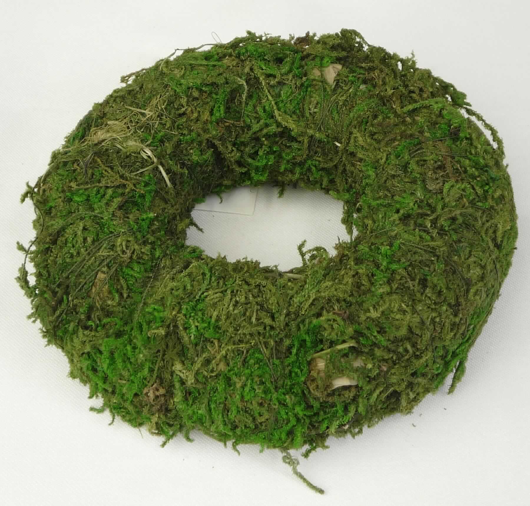 "Kranz Moos, Art. 80441390000"
- vollständig aus getrocknetem und gefärbtem Moos (Pflanzenteile), mit Spinnstoffband (Zutat) 
  zur Befestigung umwickelt, ca. 10 cm im Durchmesser,
- wird üblicherweise vom Blumenhandel zu Zierzwecken geliefert.
(Abbildung siehe Anlage)

"Kränze aus Moos zu Binde- oder Zierzwecken, getrocknet, keine Rentierflechte"