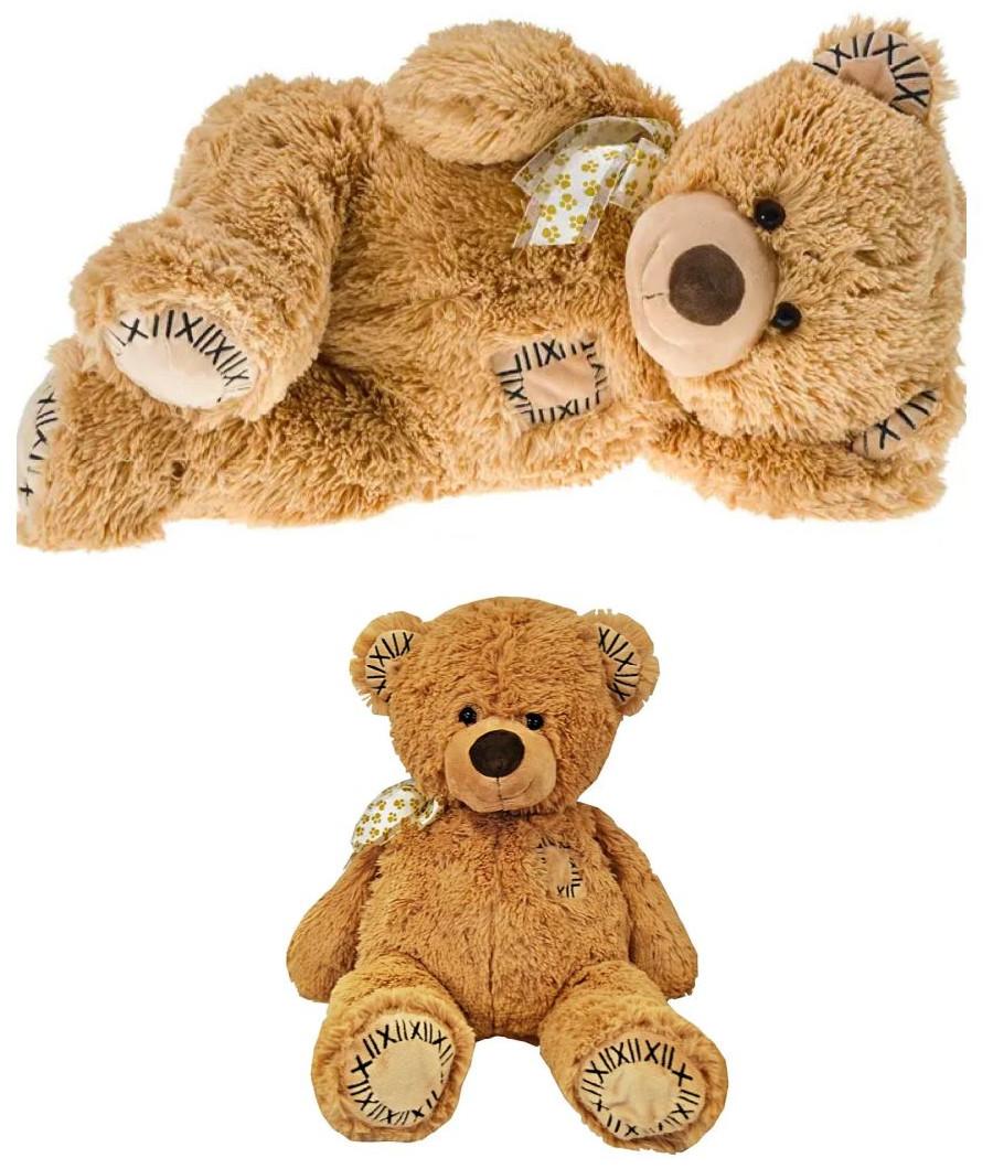 Bei dem durch eine Abbildung veranschaulichten Spielzeug handelt es sich um einen laut Angaben 
ca. 55 cm großen Teddybären, der aus hellbraunem Spinnstoff (Plüsch) zusammengenäht und 
innen mit Ausnahme der Ohren vollständig mit weichem Material gefüllt ist. Der Kopf, die Arme 
und Beine des Bären sind durch Scheibengelenke beweglich. Der Kopf ist mit ausgeformten 
Ohren, Nase und Maul sowie angenähten Augen aus Kunststoff versehen. Das Plüschtier ist auf 
der Brust mit einem aufgenähten "Patch" sowie am Hals mit einem Schleifenband verziert.  

Zolltarifrechtlich liegt" Spielzeug, ein Tier darstellend, gefüllt" vor.