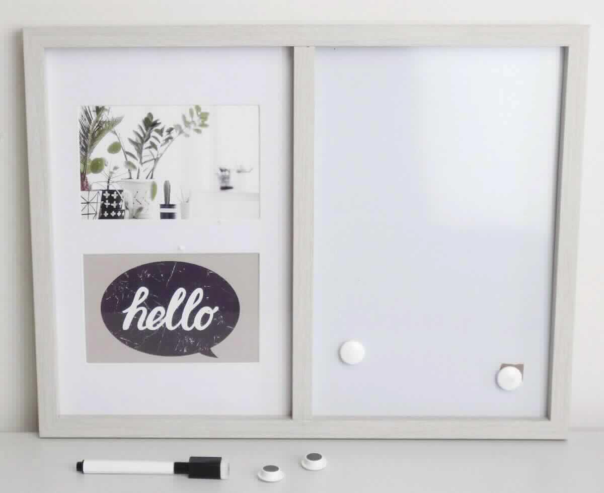 Es handelt sich bei dem sog. "Memoboard natur, Art. 8107781, 8108078" um eine Warenzusammenstellung in Aufmachung für den Einzelverkauf, bestehend aus einer gerahmten Tafel mit einer wiederbeschreibbaren Vorderseite aus Kunststoff und einem magnetischen Innenteil, vier Dauermagneten und einem Filzschreiber, zusammengesetzt mit einer magnetischen Schutzkappe und Wischer zum Befestigen an der Tafel. 

Aufgrund der Bedeutung für die Verwendung bestimmt die Tafel den Charakter gemeinsam verpackten Warenzusammenstellung. 

Die Ware ist als "Tafel zum Schreiben" einzureihen.