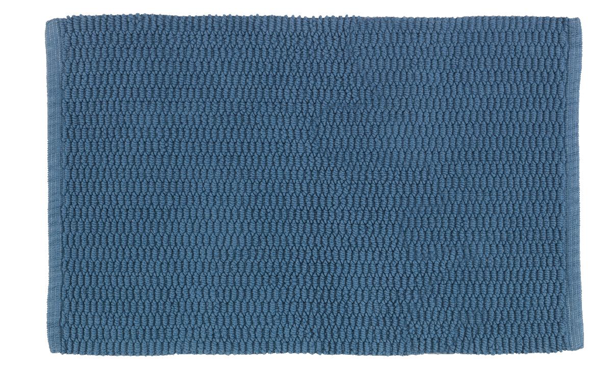 Fußbodenbelag, Foto siehe Anlage,
- mit einer bedruckten Papierbanderole umhüllt,
- rechteckig, in den Abmessungen von laut Antrag 50 cm x 80 cm,
- aus einfarbigen Schlingengeweben nach Art der Frottiergewebe, somit keine Ware der 
  Position 5705,
- aus laut Antrag 100 % Baumwolle,
- an den Schmalseiten durch Umschlagen und Festnähen gesäumt (u. a. somit konfektioniert),
- mit einer Aufhängeschlaufe versehen,        
- kein Kelim, Sumak, Karamanie oder ähnlicher handgewebter Teppich,
- auf der Rückseite rutschhemmend ausgerüstet,
- erfüllt die Bedingungen zur Einreihung als Fußbodenbelag.

"Fußbodenbelag, aus Spinnstoffen, gewebt, weder getuftet noch beflockt, konfektioniert, kein
 Kelim, Sumak, Karamanie und ähnlicher handgewebter Teppich, kein Fußbodenbelag aus
 Kokosfasern, mit Flor, aus Baumwolle"