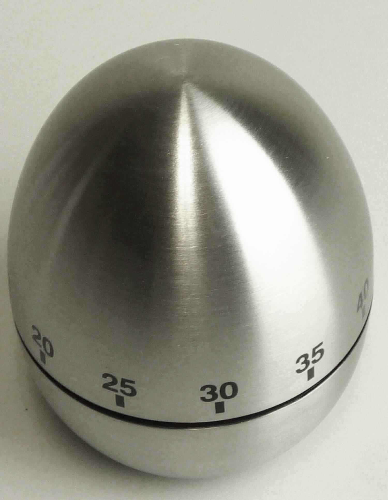 Es handelt sich um einen Kurzzeitmesser (Minutenzähler) mit mechanischem Läutwerk in Eiform (Artikel 27245), ca. 70 x 60 mm groß (Höhe x Durchmesser), in einem zweigeteilten Gehäuse aus gebürstetem Edelstahl. Der obere Teil, auf dem sich das Zifferblatt mit der Zeitmesseinteilung von 0 bis 55 (in Zahlen und Stricheinteilung) befindet, dient zum Aufziehen des Zeitmessers. Das aufgezogene Messwerk beginnt von der eingestellten Zahl an rückwärts bis 0 zu laufen und löst dann ein Klingelzeichen aus.

Die in einer durchsichtigen Kunststoffbox mit bedrucktem Pappinlay verpackte und für den Haushalt (Küche) bestimmte Ware (sog. Eieruhr) ist als "Zeitmesser, mit Uhrwerk" einzureihen.
