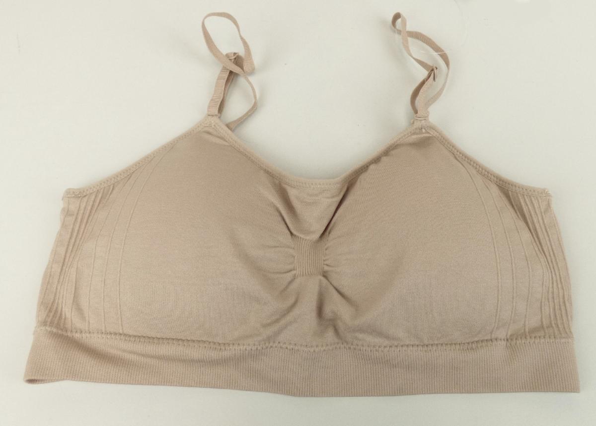 Bustier, Größe M, Foto siehe Anlage,
- in einem Polybeutel verpackt,
- aus ca. 0,8 mm dicken, einfarbigen Gewirken aus laut Antrag 90 % Nylon und 10 % Spandex
  (beides synthetische Chemiefasern),
- bis kurz unter die Brust reichend (Rückenlänge: ca. 31 cm),
- mit ca. 0,8 cm breiten, abnehmbaren, in der Länge verstellbaren, sog. Spaghettiträgern,
- vorn etwa in der Mitte durch Änderung der Wirkart gerafft,
- im Rückenteil mit einem Haken- und Ösenverschluss,
- im Vorderteil mit einer durchgehenden Innentasche zur Aufnahme der herausnehmbaren Polster,
- am unteren Rand mit einem doppelt gearbeiteten, ca. 3 cm breiten, elastischen Abschluss; an den
  übrigen Rändern mit schmalen, elastischen Bändern eingefasst,
- ohne ausgearbeitetes Büstenteil; das Kleidungsstück ist nach Schnitt und Ausstattung nicht dazu
  bestimmt, die Einzelbüste zu stützen, zu formen oder zu korrigieren (somit keine Ware der
  Position 6212).

"Kleidung, andere als in den Positionen 6101 bis 6113 genannte, aus Gewirken, aus Chemiefasern"