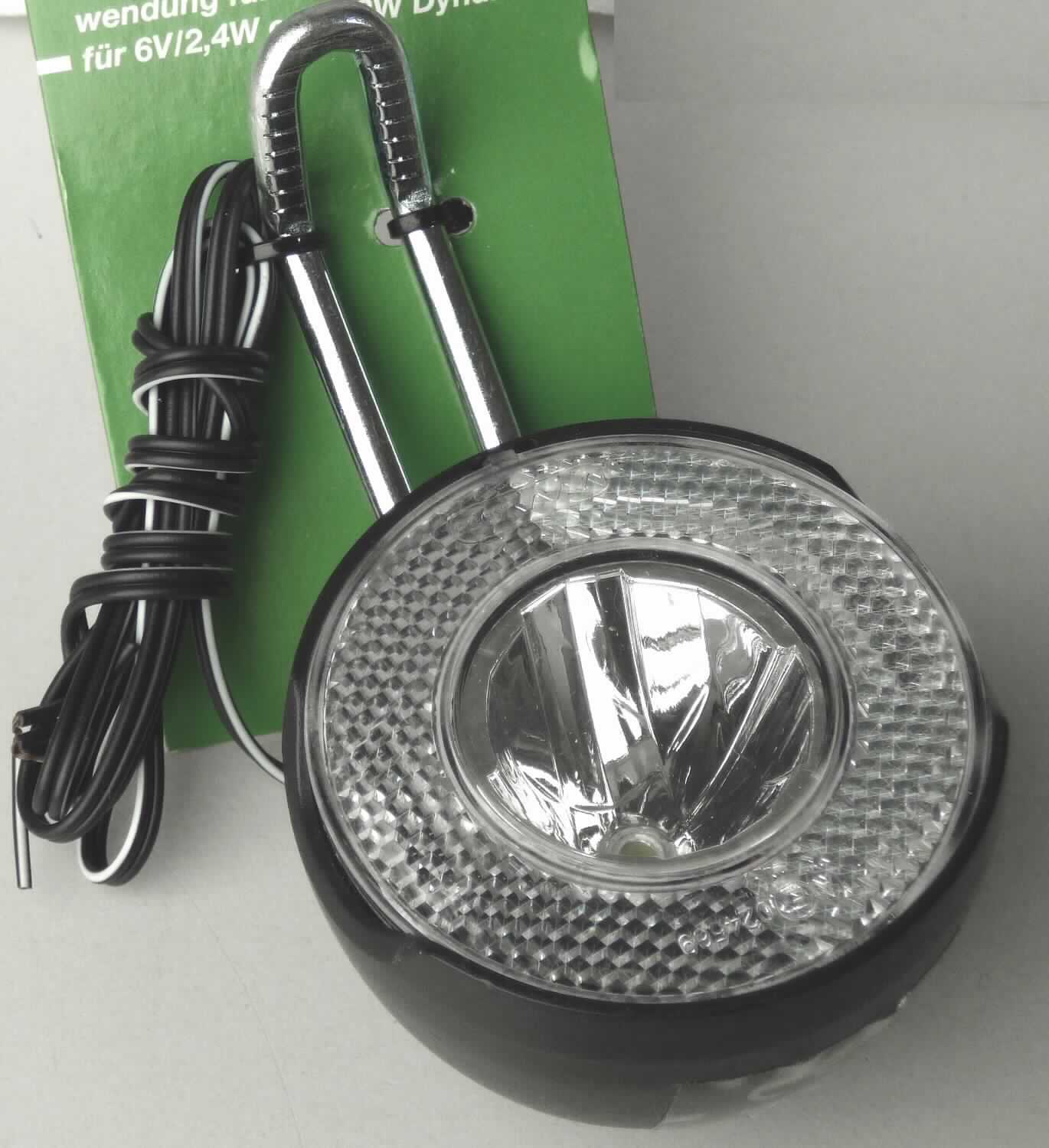LED-Frontscheinwerfer Art. 40031 (Abbildung s. Anlage)
- aus einer Leuchtdiode und Ansteuerelektronik in einem zylindrischen Kunststoffgehäuse 
  (Durchmesser 65 mm) mit Reflektor und klarsichtiger Abdeckung, Ein-/Ausschalter,
  Anschluss für Dynamo, Montagevorrichtung zur Befestigung an einem Fahrradrahmen 
  und einem fest angebrachten Anschlusskabel,
- aufgemacht auf einem bedruckten Pappträger,
- zur Verwendung als Frontscheinwerfer für Fahrräder.

"Elektrisches Beleuchtungsgerät von der für Fahrräder verwendeten Art; sog. LED-Frontscheinwerfer"
