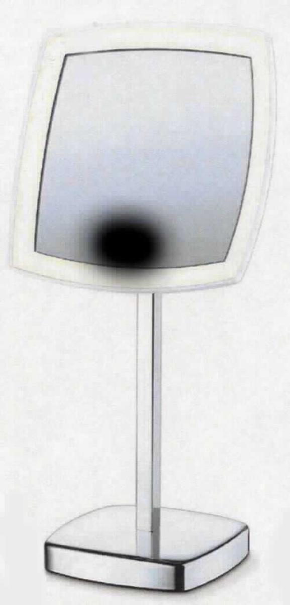 Spiegel aus Glas, Foto siehe Anlage,
- ein Warenmuster wurde nicht vorgelegt, die Einreihung erfolgt daher aufgrund der Antragsangaben,
- zusammengesetzte Ware bestehend aus: 
- einem quadratischen Spiegel aus Glas, 
- - mit einem Spiegel mit 5-fach Vergrößerung, 
- - gefasst in einem eckigen Rahmen aus Kunststoff, 
- - mit einer Spiegelfläche von ca. 16 cm x 16 cm, 
- - mit einer im Rahmen integrierten strombetriebenen Beleuchtung (die Beleuchtung leistet 
    lediglich Hilfsfunktion für eine bessere optische Wiedergabe des Spiegelbildes), 
- - - mit Batterie- oder Netzbetrieb (mit drei Batterien und einem Netzadapter),
- - mit einem Ständer aus unedlem Metall (verchromt), 
- der Spiegel aus Glas bestimmt aufgrund seiner Bedeutung in Bezug auf die Verwendung 
  den Charakter der Ware,
- in den Abmessungen: ca. 20 cm (Breite) x 13 cm (Höhe) x 38,7 cm (Länge).

"Spiegel aus Glas, kein Rückspiegel, gerahmt"