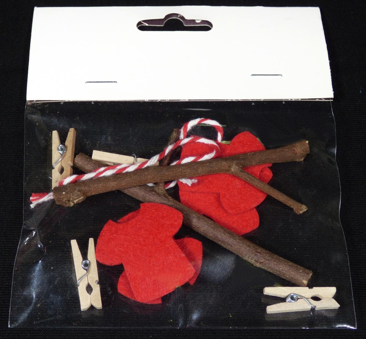 Bei den durch ein Warenmuster veranschaulichten Erzeugnissen handelt es sich um Spielzeug 
in Aufmachung in Form eines Bastel-Sets, bestehend aus: 
- zwei ca. 10 cm langen, dünnen Astabschnitten, die jeweils eine kleine Astgabelung am 
  oberen Ende aufweisen,
- einer ca. 28 cm langen, zweidrähtigen Schnur aus weißen und roten Spinnstoffgarnen,
- vier aus rotem Filz ausgestanzten, stilisierten Kleidungsstücken in Form von T-Shirts,
- vier Mini-Wäscheklammern aus überwiegend Holz mit Feder aus unedlem Metall, 
gemeinsam in einer klarsichtigen Kunststoffhülle an einer Pappkarte aufgemacht.
Das Bastel-Set wird laut Angaben zum Herstellen einer stilisierten Wäscheleine verwendet, 
die zu verschiedenen Dekorationszwecken dient. Die Spinnstoffschnur wird dazu durch Kleben 
oder Knoten an den beiden Astabschnitten befestigt und die Filzabschnitte als Wäschestücke 
mittels der Miniaturklammern an die Schnur geklemmt, so dass eine "befüllte Wäscheleine"
entsteht.
Das Bastelset dient der Unterhaltung insbesondere von Kindern besitzt aufgrund der speziell 
dafür zusammengestellten Waren in der Gesamtheit den wesentlichen Charakter von Spielzeug.

Zolltarifrechtlich liegt "Spielzeug, aufgemacht in einer Aufmachung" vor.