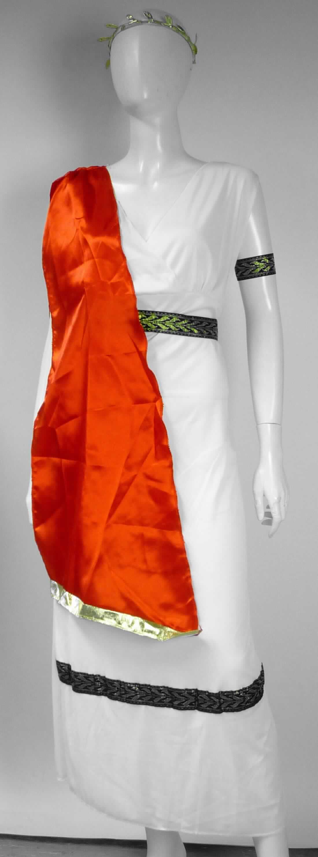 Maskenkostüm, sog. Göttin-Kostüm, in Größe M, Foto siehe Anlage,
- Warenzusammenstellung, bestehend aus einem Kleid, einem Gürtel (Bekleidungszubehör), zwei Armbändern 
  (andere konfektionierte Spinnstoffwaren) und einem Haarreif (Karnevalsartikel),
- gemeinsam in einem Polybeutel mit bedrucktem Pappeinleger für den Einzelverkauf aufgemacht und zur 
  Befriedigung eines speziellen Bedarfs zusammengestellt,
- Kleid:
-- aus ca. 0,4 mm dicken, einfarbigen Gewirken aus laut Antrag 100 % Polyester (synthetische Chemiefasern), 
-- etwa bis zu den Knöcheln reichend (Rückenlänge: ca 153 cm),
-- ärmellos, im Brustbreich mit asymmetrisch angeordneten Vorderteilen, die sich von rechts auf links überlappen 
    und dadurch einen V-förmigen Ausschnitt bilden,
-- vorn (etwa unterhalb der Knie) mit einem aufgenähten Streifen aus einem ca. 4 cm breiten, buntgewebten 
    Gewebeband aus Spinnstoffen,
-- mit einer im Bereich der rechten Schulter mittig gerafften, angenähten "Schärpe" aus einfarbigen (roten) 
   Geweben aus Spinnstoffen, die vorn an einem Ende einen angesetzten Streifen aus mit einem goldfarbenen
   Überzug versehenen Gewirken aus Spinnstoffen aufweist,
-- an allen Rändern mit einer Überwendlichnaht gesäumt,
-- kann aufgrund der Länge ohne ein weiteres, den Unterkörper bedeckendes Kleidungsstück getragen werden,
-- gehört als Maskenkostüm aus Spinnstoffen nicht zum Warenkreis der Position 9505,
-- insbesondere im Hinblick auf den Umfang bestimmen die Gewirke den Charakter des Kleides,
- Gürtel: mit einer Gesamtlänge von ca. 152 cm; im etwa 51 cm langen Mittelteil aus dem oben genannten, 
   buntgewebten Gewebeband; an den Seiten mit angesetzten Zuschnitten aus den oben genannten Gewirken,
- Armbänder: aus ca. 32 cm langen Zuschnitten aus dem oben genannten, buntgewebten Gewebeband, jeweils 
  mit einem aufgenähten Samt- bzw. Schlingengewebe als Klettverschluss, 
- Haarreif: ca. 0,7 cm breiter und ca. 37 cm langer, mit einem Gewebeband aus Spinnstoffen umwickelter Reif 
  aus augenscheinlich Kunststoff, auf der Oberseite mit einem aufgeklebten, stilisierten Lorbbeerblätterzweig 
  aus entsprechend ausgestanzten, mit einem goldfarbenen Überzug versehenen Geweben aus Spinnstoffen, 
- das Kleid verleiht der Warenzusammenstellung im Hinblick auf den Umfang und die Verwendung ihren 
  wesentlichen Charakter.

"Kleid, aus Gewirken, für Frauen, aus synthetischen Chemiefasern"
