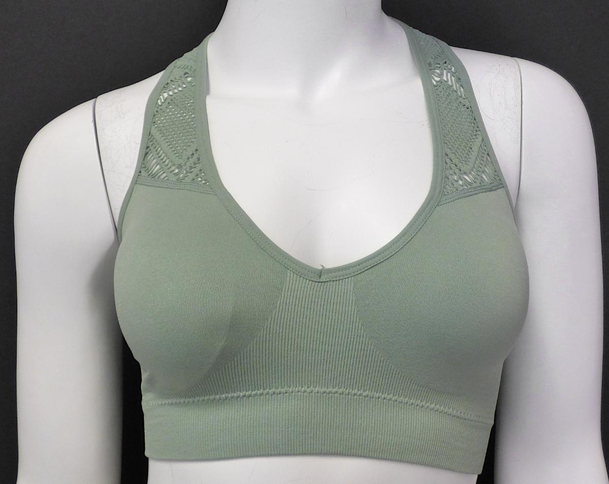 Büstenhalter, sog. Sport Bustier Honey Cumb Khaki, Art. 338809, Größe 36/38, Foto siehe Anlage,
- aus bis zu ca. 1,3 mm dicken, unterschiedlich strukturierten, einfarbigen Gewirken aus laut Antrag
  93 % Polyamid und 7 % Elasthan (beides synthetische Chemiefasern),
- im Brustbereich durch Änderung der Wirkart mit ausgearbeiteten, die natürliche Form der Brust
  nachzeichnenden Büstenteilen von konvexer Form,
- mit eingelegten Polstern,
- mit ca. 3,5 cm breiten Schulterträgern,
- ohne Öffnung und ohne Verschluss,
- entlang der oberen Ränder mit schmalen Streifen aus Gewirken eingefasst,
- mit einem doppelt gearbeiteten, ca. 3,5 cm breiten, elastischen unteren Rand, der eng am Körper
  anliegt,
- die Ware ist geeignet, die Einzelbüste zu stützen, zu korrigieren und zu formen.

"Büstenhalter, aus Gewirken, nicht in Warenzusammenstellung für den Einzelverkauf aufgemacht"