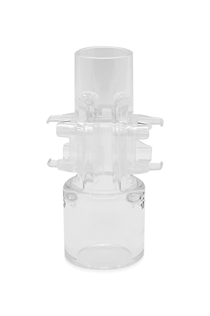 Sog. Adapter, im Wesentlichen bestehend aus einer spezifisch geformten, transparenten, hohlzylindrischen, ca. 57 mm langen Kunststoffvorrichtung, welche patientenseitig mit einem 22 mm Anschluss, geräteseitig mit einem 15 mm Anschluss und im Mittelteil mit einer spezifisch geformten, mit zwei Antibeschlagfolien versehenen Aufnahmevorrichtung für einen speziellen CO2-Sensor (nicht Gegenstand dieser vZTA-Entscheidung) versehen ist. Zur äußeren Form siehe Abbildung in der Anlage. 
Der Adapter wird bei intubierten Patienten zwischen dem Patiententubus und dem Schlauch des Beatmungsgerätes (beides nicht Gegenstand dieser vZTA-Entscheidung) eingefügt. Er dient der Befestigung des CO2-Sensors, welcher mittels Infrarot-Absorptionsspektroskopie den CO2-Gehalt der Ausatemluft des Patienten bestimmt und seinerseits mit einem Patientenmonitor (ebenfalls nicht Gegenstand dieser Auskunft) verbunden wird. Die Anti-Beschlag-Membran des Adapters ermöglicht eine genaue CO2-Messung mittels CO2-Sensoren ohne Heizung.
Die Ware ist in einer Kunststofftüte zu je 30 Stück in einem Pappkarton verpackt.

Keine Einreihung in die Position 9018, da entprechend des Prinzips der primären Zweckbestimmung der CO2-Sensor die übergeordnete Hauptware darstellt. 

Die Ware wird als „Zubehör, erkennbar hauptsächlich bestimmt für ein Untersuchungsgerät für Gase oder Rauch“ eingereiht.