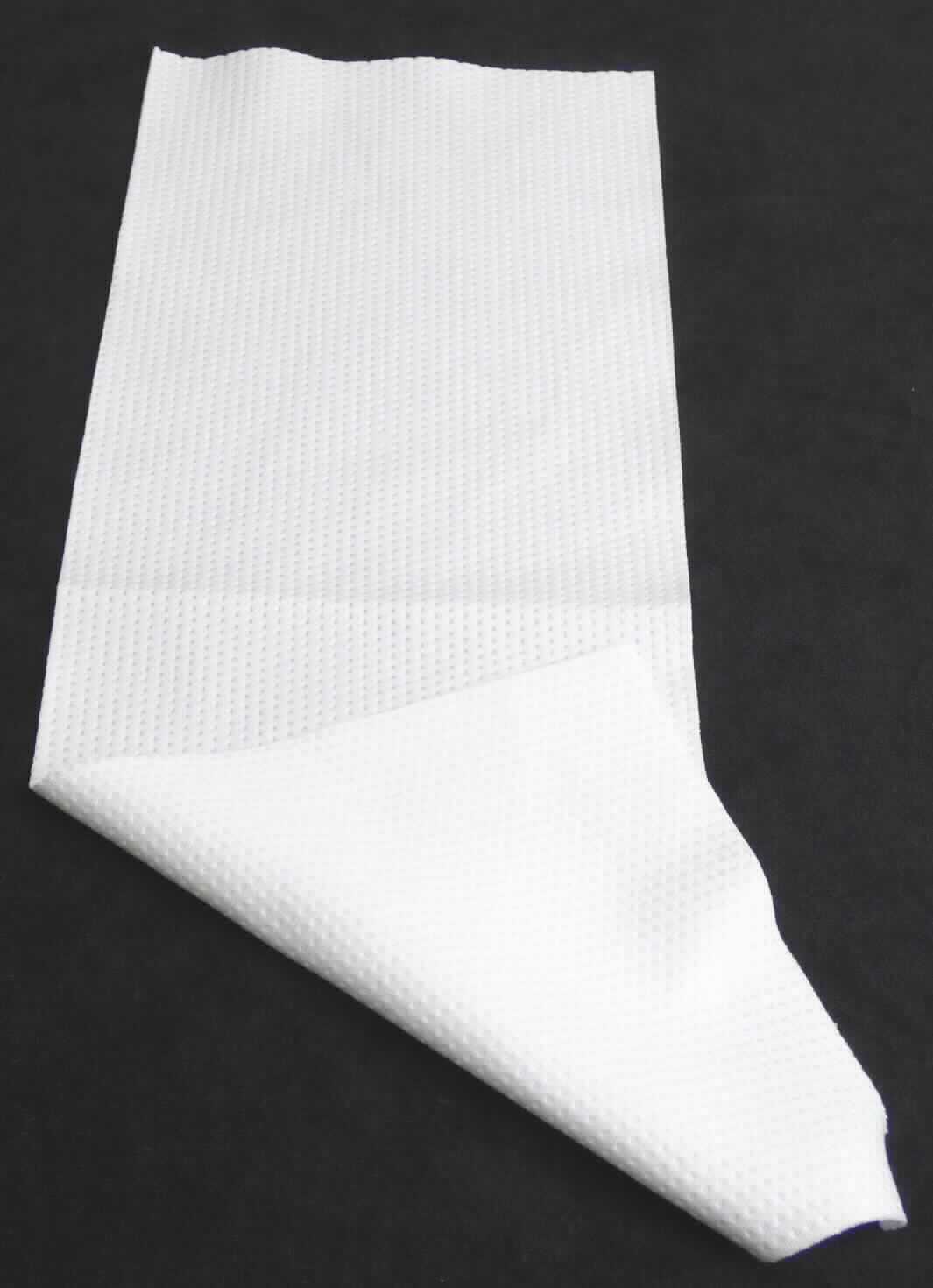 Kuliergewirke, sog. Tuch HC Polyester, Foto siehe Anlage,
- in einem Polybeutel verpackt,
- lediglich rechteckig heiß zugeschnitten (somit nicht konfektioniert; damit keine Ware der Position 6307), in den 
  Abmessungen (L x B) von laut Antrag 15 cm x 30 cm bzw. 15 cm x 41 cm,
- aus synthetischen Chemiefasern (laut Antrag Polyester),
- keine Elastomergarne oder Kautschukfäden enthaltend,
- kein Samt, Plüsch, Schlingengewirke oder Schlingengestricke,
- keine Raschelspitze.

"Gewirke, mit einer Breite von weniger als 30 cm, anderes als solche der Positionen 6001 und 6002, aus 
 synthetischen Chemiefasern, anderes als in der Unterposition 6003 3010 genannte"
