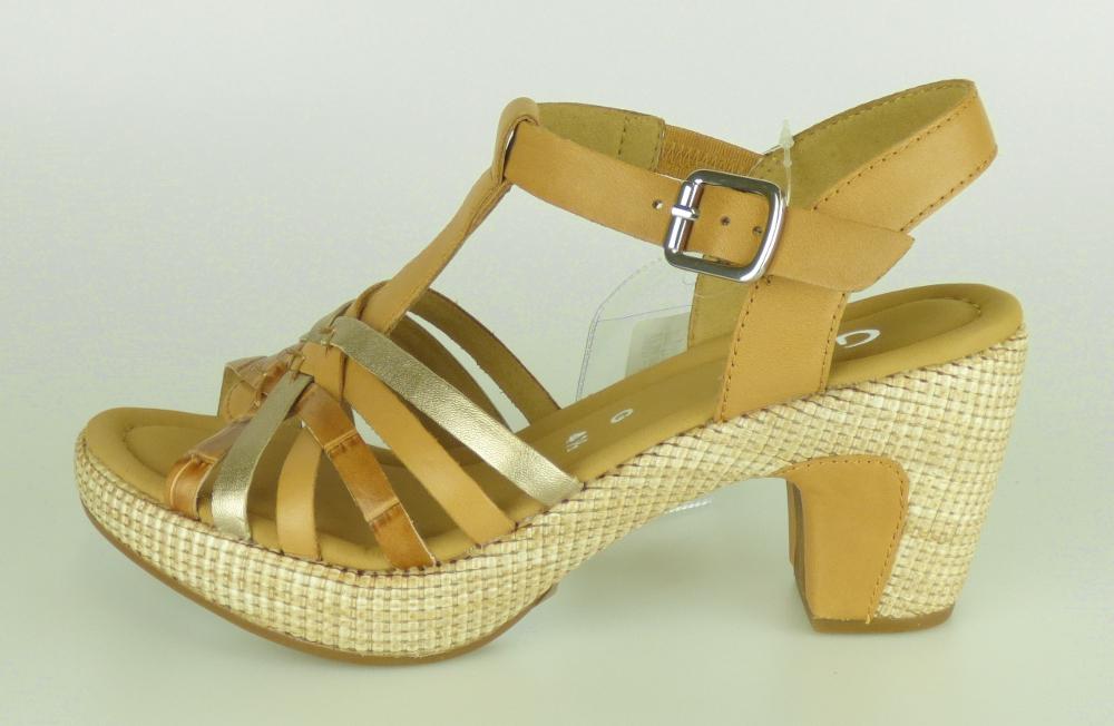 Sandalen mit Absatz, Größe 4,5, Foto siehe Anlage,
- mit Laufsohlen aus Kautschuk/Kunststoff; ohne Hauptsohle aus Holz,
- mit zehenfreiem Oberteil (nicht geschlossenes Blatt) aus Leder,
- mit Schnallenverschluss,
- nicht den Knöchel bedeckend,
- mit einer größten Höhe des Absatzes und der Sohle von ca. 8 cm.

"Schuhe mit Laufsohlen aus Kautschuk/Kunststoff und Oberteil aus Leder, andere als in den 
 Unterpositionen 6403 1200 bis 6403 9905 genannte, mit nicht geschlossenem Blatt, mit Absatz
 und Sohle mit einer größten Höhe von mehr als 3 cm"