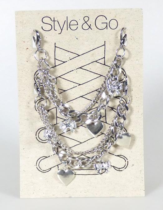 Sogenannter Schuhschmuck "STYLE & GO KETTE DECO"

Es handelt sich um Fantasieschmuck aus unedlen Metallen zur Verzierung von Schnürsenkeln bestehend aus einer 5% Zinklegierung und 95% Eisen
Die Ware besteht aus zwei Dekoelementen mit jeweils zwei Gliederketten, eine Kette ohne Anhänger, eine Kette mit Anhängern in Form von zwei Schleifen und zwei Herzen. Die Ketten sind jeweils mit zwei Karabinerhaken zur Befestigung am Schuh ausgestattet.
Keine Handarbeit, nicht in Verbindung mit Glas.
Antragstellerangaben -
Abbildung siehe Anlage.

Derartige Erzeugnisse sind als "Fantasieschmuck aus unedlen Metallen, nicht versilbert, vergoldet oder platiniert (anderer als in Unterposition 7117 1100 genannter)" dem TARIC-Code 7117 1900 90 zuzuweisen.
