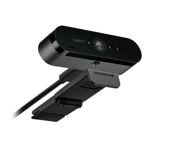 Webcam (Abbildung siehe Anlage)
- aus einem Bildsensor (Auflösung: 4096 x 2160 Pixel), Objektiv und zwei Mikrofonen in einem
  Gehäuse mit USB-Anschluss, zusammengesetzt mit einer Haltevorrichtung,
- ohne internen Bildspeicher,
- zur Aufnahme und Übertragung von Videobildern mit Ton nach
  Anschluss an die USB-Schnittstelle einer automatischen Datenverarbeitungsmaschine,
- zur Verwendung als Webcam,
- zusammen mit Beipack (mit Abdeckblende, USB-Kabel, Reise-Etui und Bedienungsanleitung).
Die Webcam bestimmt den Charakter des Ganzen.

"Fernsehkamera mit Bildsensor, nicht von den TARIC-Codes 8525 81 00 00
 bis 8525 83 00 00 erfasst (Fernsehkamera, zusammengesetzt mit nicht charakter-
 bestimmender Haltevorrichtung, in Warenzusammenstellung mit nicht charakter-
 bestimmendem Beipack, in Aufmachung für den Einzelverkauf)"