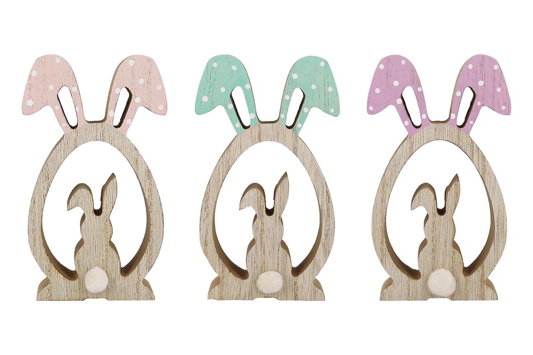 Nach den Angaben der Antragstellerin sowie dem vorgelegten Warenmuster handelt es sich bei der Ware mit der Artikelnummer 703762 um eine sog. „Dekofigur Hase im Ei“ (H 12 x B 7 x T 2 cm).

Das Erzeugnis besteht aus Holz (MDF) und stellt den Umriss eines Hasen mit eiförmigem Körper dar, in dessen Mitte zusätzlich eine Hasenfigur ausgesägt ist.
Die Vorderseite der Zierfigur ist mit Echtholz furniert, an den Ohren rosa bemalt und mit einem weißen Pompom, den Schwanz der Hasen darstellend, beklebt.

Derartig gestaltete Erzeugnisse dienen der Ausgestaltung des Osterfestes.

Zolltarifrechtlich handelt es sich um einen "Festartikel, andere als Weihnachtsartikel".