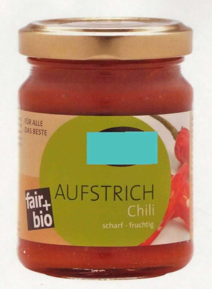 Brotaufstrich auf der Grundlage von Gemüse.

Antragsangaben (als zutreffend unterstellt): Brotaufstrich mit Tomatenmark, Paprika und Chili. Es wurden vertrauliche Angaben zur Zusammensetzung der Ware gemacht. Aufmachung: in 125 g-Schraubdeckelgläsern.

Beschaffenheit des vorgelegten Warenmusters: etikettiertes Originalschraubdeckelglas, für den Einzelverkauf aufgemacht. Inhalt: rotorange, streichfeste, mit Schalenbestandteilen durchsetze Masse. Geruch: nach Tomate und Paprika, essigsauer. Geschmack: leicht süß, scharf, nach Paprika mit brennendem Geschmack, nach Tomate.
Gehalt an freier flüchtiger Säure (gemäß Angabe): mehr als 0,5 GHT. 

Der Gemüseanteil bestimmt den Charakter der Ware. Es liegt eine zur Verwendung als Brotaufstrich bestimmte Zubereitung auf der Grundlage von Gemüsen vor.

Gemüse, mit Essig oder Essigsäure zubereitet oder haltbar gemacht, anderes als in den Unterpositionen 2001 1000 bis 2001 9092 der KN genannt, anderes, mit Zusatz von Zucker.