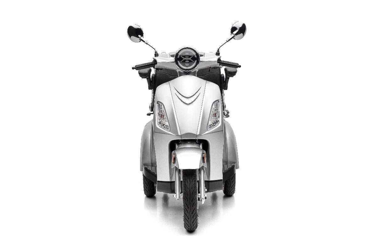 Kraftfahrzeug, sog. Elektro-Dreirad, Fotos siehe Anlage, 
- in Form eines dreirädrigen, motorrollerähnlichen, von einem Elektromotor angetriebenen
  Kraftfahrzeugs,
- mit einer waagerechten Plattform mit Rädern, einem Sitz mit Armlehnen sowie 
  einer Rückenlehne,
- laut Antrag mit einer Leistung von 1000 Watt und einer Höchstgeschwindigkeit von 20 km/h,
- laut Datenblatt:
- - mit den Abmessungen: 1560 mm x 680 mm x 1070 mm (L x B x H) und 
    einem Radstand von 1100 mm,
- - mit einem Gewicht von 158 kg,
- im Heck mit zwei zusätzlichen Stützrädern ausgestattet,
- mit einer Lenksäule mit einem Griff und Steuerelementen für das Fahren ausgestattet,
- mit zwei Heckleuchten und zwei Frontscheinwerfern, 
- mit zwei Seitenspiegeln, 
- mit einem Transportbehältnis, das an der Rückseite des Sitzes befestigt ist,
- mit einem Vorwärts- und Rückwärtsgang (Automatik),
- insbesondere aufgrund des Rückwärtsgangs keine Ware der Position 8711.

"Kraftfahrzeug, seiner Beschaffenheit nach hauptsächlich zur Personenbeförderung bestimmt, anderes Kraftfahrzeug ausschließlich mit Elektromotor angetrieben, neu, anderes als in Codenummer 8703 8010 10 0 genannte"