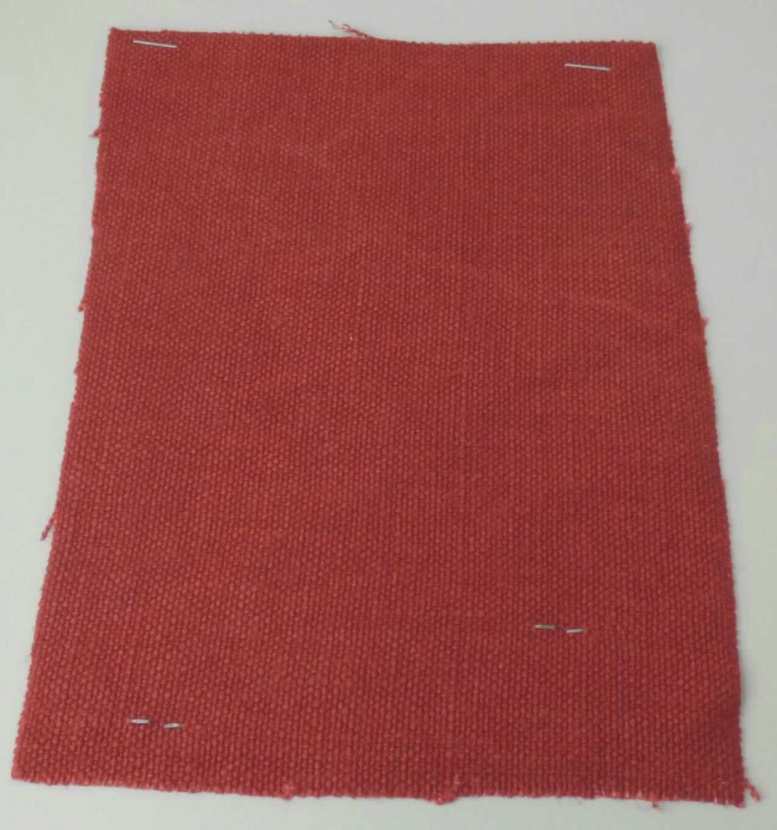 Gewebe, Foto siehe Anlage,
- als Meterware,
- laut Untersuchungsergebnis:
-- aus 100 GHT Leinen (Flachs),
-- gefärbt. 

"Gewebe aus Flachs (Leinengewebe), mit einem Anteil an Flachs von mehr als 85 GHT, gefärbt"