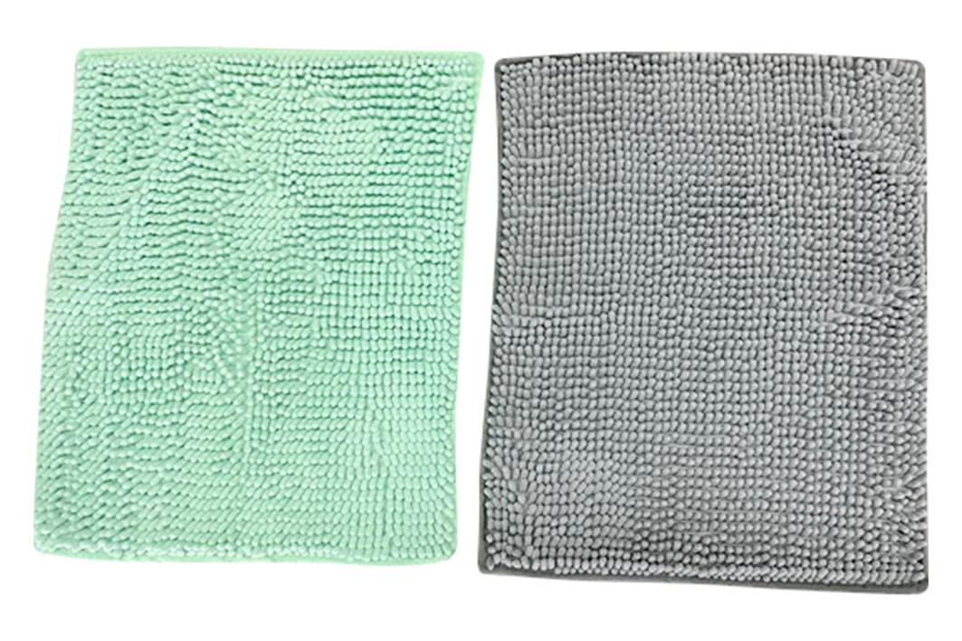 Fußbodenbelag, sog. Badvorleger, Art. 796197, Foto siehe Anlage,
- rechteckig, mit den Abmessungen von laut Antrag 50 cm x 40 cm,
- aus synthetischen Spinnstoffen (laut Antrag Polyester),
- getuftet (Nadelflor),
- mit einem Grund aus einem Gewebe und einem nachträglich in das Grundgewebe eingezogenen Flor
  aus Chenillegarnen,
- an den Rändern mit schmalen Gewirkestreifen eingefasst (damit konfektioniert; keine Fliese),
- auf der Rückseite rutschhemmend ausgerüstet,
- erfüllt die Bedingungen zur Einreihung als Fußbodenbelag.

"Fußbodenbelag (Badematte), aus Spinnstoffen, getuftet (Nadelflor), konfektioniert, aus synthetischen
 Spinnstoffen (Polyester), keine Fliese"