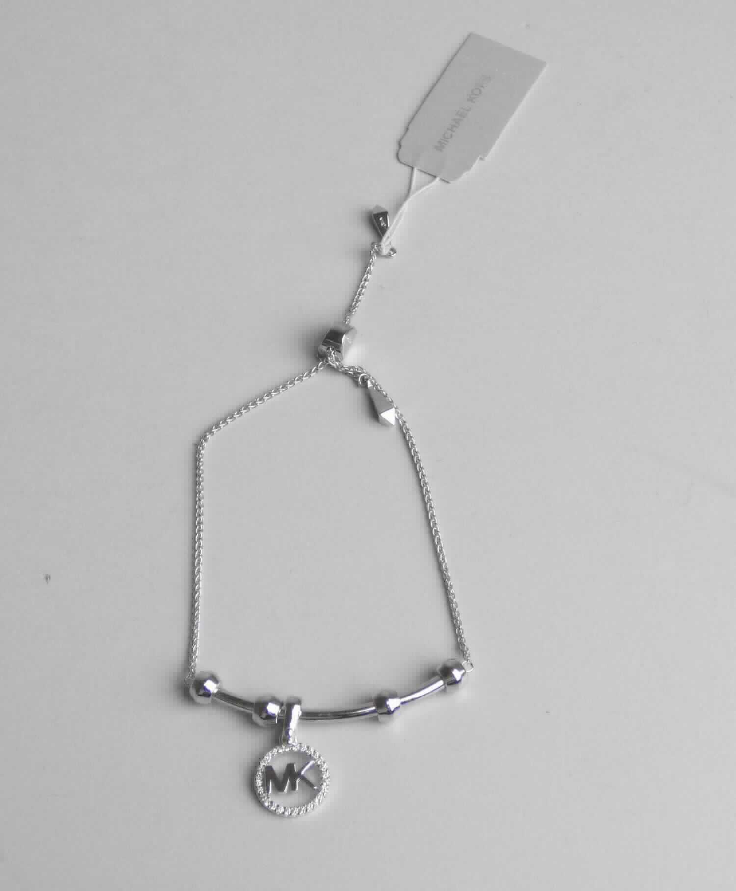Es handelt sich um eine Schmuckware in Form eines Armbandes aus einer mit Rhodium (