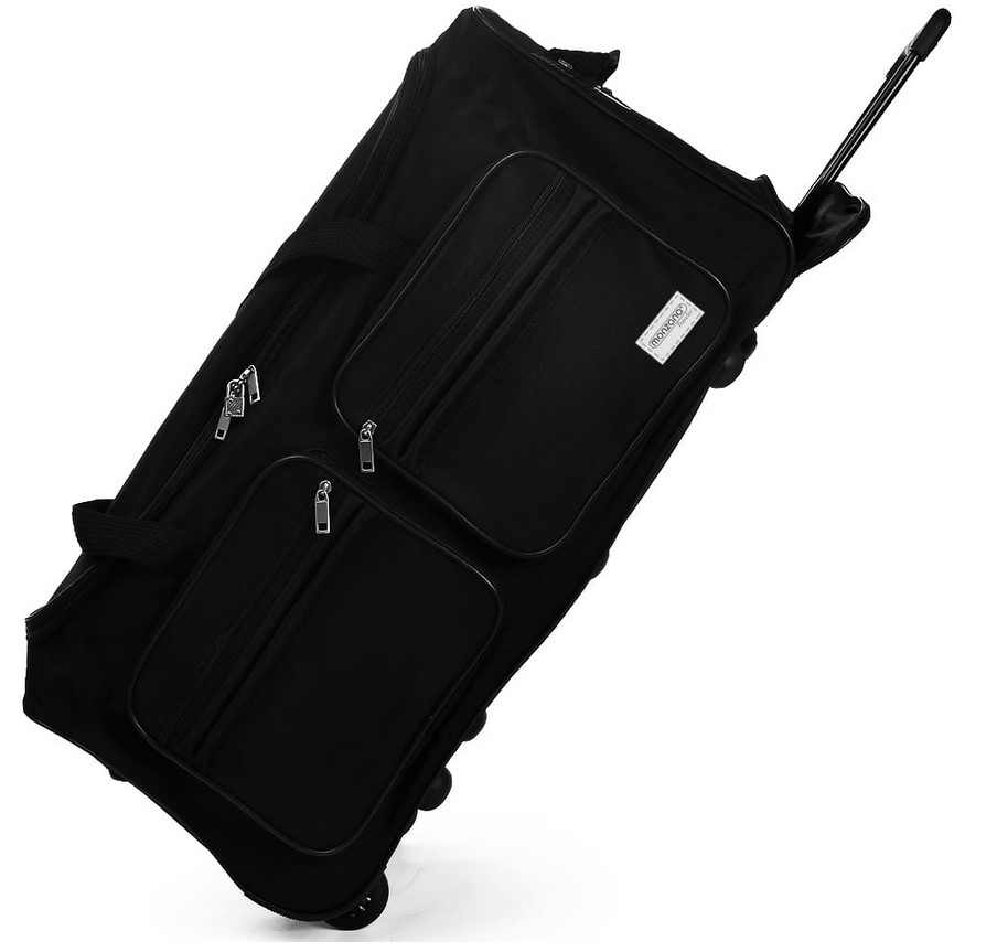 Reisetasche, Foto siehe Anlage,
- nach den Antragsangaben:
- - mit einer Außenseite aus Spinnstoffen, 
- - am Bodenteil mit vier Stellfüßen aus Kunststoff,
- - mit einem ausziehbaren Griff zum Ziehen der Reisetasche auf zwei Rollen (Trolleyfunktion),
    der bei Nichtgebrauch in einem Reißverschlussfach versenkbar ist,
- - mit zwei zusammenfassbaren Tragegriffen und einem Handtragegriff an einer Schmalseite,
- - an einer Längsseite mit zwei aufgesetzten Reißverschlussfächern,
- - an einer Schmalseite mit einem eingesetzten Reißverschlussfach,
- - das Hauptfach ist mit einem an drei Seiten umlaufenden Reißverschluss zu öffnen; zusätzlich
    mit einem Hängeschloss aus unedlem Metall versehen,
- - - teilweise gefüttert; ohne Inneneinteilung,
- - mit den Abmessungen: ca. 70 cm (Länge) x 36 cm (Breite) x 34 cm (Höhe),
- - in unterschiedlichen Farben, 
- - ohne Hinweise auf Handarbeit.

"Reisetasche, mit Außenseite aus Spinnstoffen, nicht handgearbeitet"
