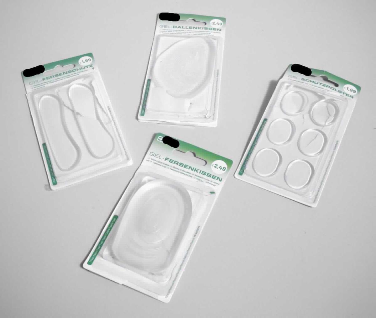 Gel-Fersenschutz (Foto siehe Anlage)
- annähernd nierenförmiges, selbsthaftendes Kunststofferzeugnis,
- zum Einsetzen in den Fersenbereich von Schuhen, 
- herausnehmbar,
- ohne Hinweise auf Handarbeit.

"Fersenstück (herausnehmbare Ware), nicht handgearbeitet"