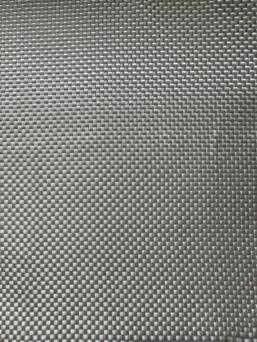 Gewebe, Foto siehe Anlage,
- als Meterware, laut Antrag mit einer Breite von mehr als 30 cm,
- aus ungezwirnten, laut Antrag hochfesten Garnen aus synthetischen Filamenten (laut Antrag
  Polyester),
- in Leinwandbindung.

"Gewebe aus Garnen aus synthetischen Filamenten, aus hochfesten Garnen aus Polyester"