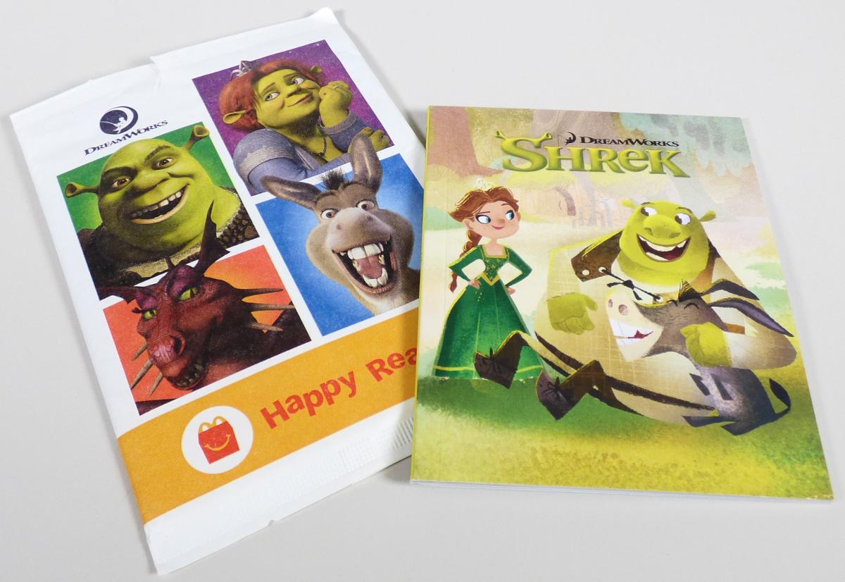 Bei der als "Mc Donald's - Dreamworks Allstars - 2022, Motiv: Shrek (Book 1)" bezeichneten Ware handelt es sich um ein mit Text und Abbildungen bedrucktes, broschiertes Druckerzeugnis (Format: etwa 11,4 x 14,3 cm, Umfang: 32 Seiten ohne Umschlag, Klebebindung). Es enthält im Wesentlichen eine zum Lesen bestimmte, reich illustrierte fortlaufende Geschichte für Kinder in englischer Sprache. Daneben sind drei Doppelseiten mit zwei Malvorlagen und zwei Rätseln (z. B. Wortsuche) sowie einer Seite mit den Lösungen bedruckt. Die Ware ist in einer Umschließung aus bedrucktem, innen mit dünner Kunststofffolie überzogenen Papier verpackt.

Abbildung siehe Anlage.

Derartige Waren gehören als "durch Text charakterisierte, zum Lesen bestimmte Broschüren und ähnliche Drucke, auch illustriert" zur Codenummer 4901 99 00 00 9 des Zolltarifs.