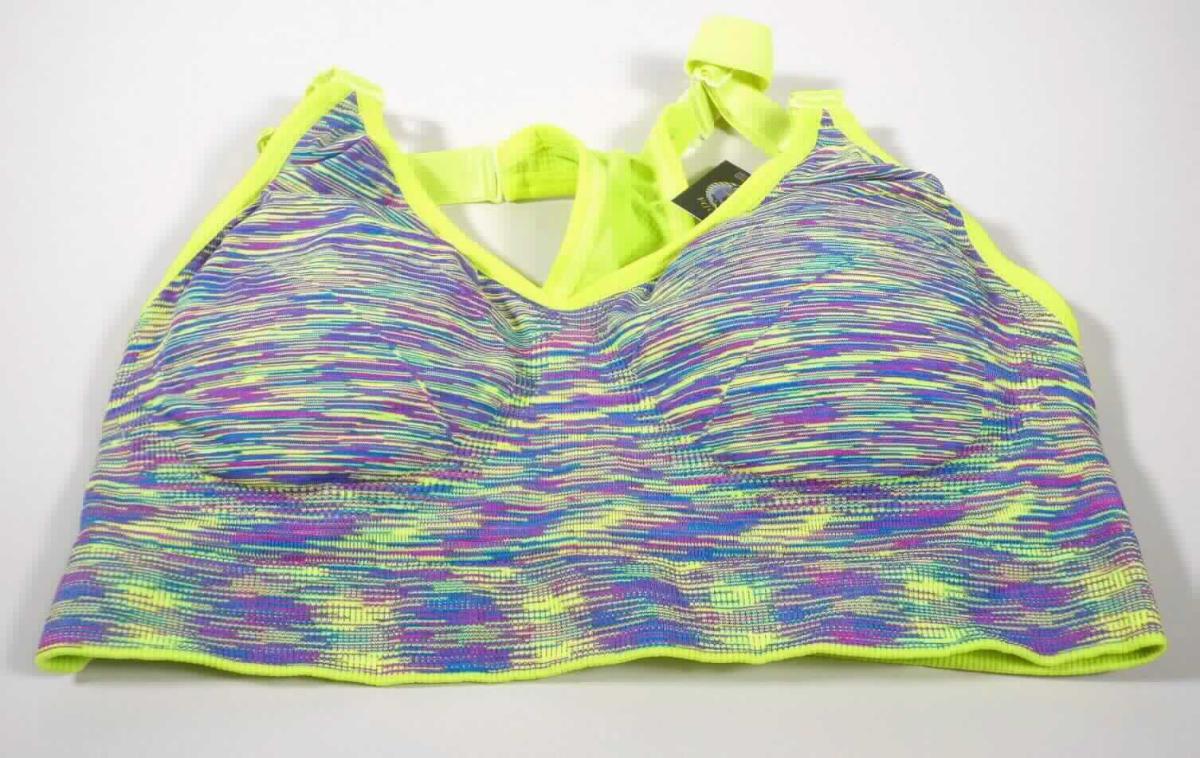 Bustier, sog. Sport-BH, in Erwachsenengröße, Foto siehe Anlage,
- aus verschiedenen, bis ca. 1,1 mm dicken, einfarbigen bzw. buntgewirkten, teilweise durch Änderung der Wirkart 
  strukturierten Gewirken aus laut Antrag Nylon und Elasthan (beides synthetische Chemiefasern); bis auf den 
  oberen Bereich des Rückenteils doppelt gearbeitet, 
- oberhalb der Taille endend (Rückenlänge: ca. 35 cm), 
- mit ca. 2 cm breiten, abnehmbaren, längenverstellbaren Trägern,
- hinten in Art eines Ringershirts gearbeitet und mit einer annähernd linsenförmigen Aussparung versehen,
- mit herausnehmbaren Polstern versehen,
- am unteren, nicht verengten, ca. 3,5 cm breiten, doppelt gearbeiteten, gerippten Rand abgepasst gewirkt; 
  an allen übrigen Rändern mit Randeinfassungen versehen,
- wird u. a. sichtbar als Oberbekleidung getragen, somit keine Ware der Position 6212.

"Andere Kleidung (Bustier), aus Gewirken, aus Chemiefasern"