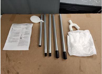 Bügler-Aufsatz für Hosen (Abbildung siehe Anlage)
- aus einem Y-Stück, zwei Stangen, einem Ballon und einer Stange mit Tropfschutz,
- zur Montage als Hosenaufsatz für einen Hemden- und Blusenbügler,
- zum Trocknen und Bügeln von Hosen.

"Teil, erkennbar ausschließlich oder hauptsächlich für Maschinen zum Bügeln von  Spinnstoffwaren
  - Bügler-Aufsatz für Hosen"