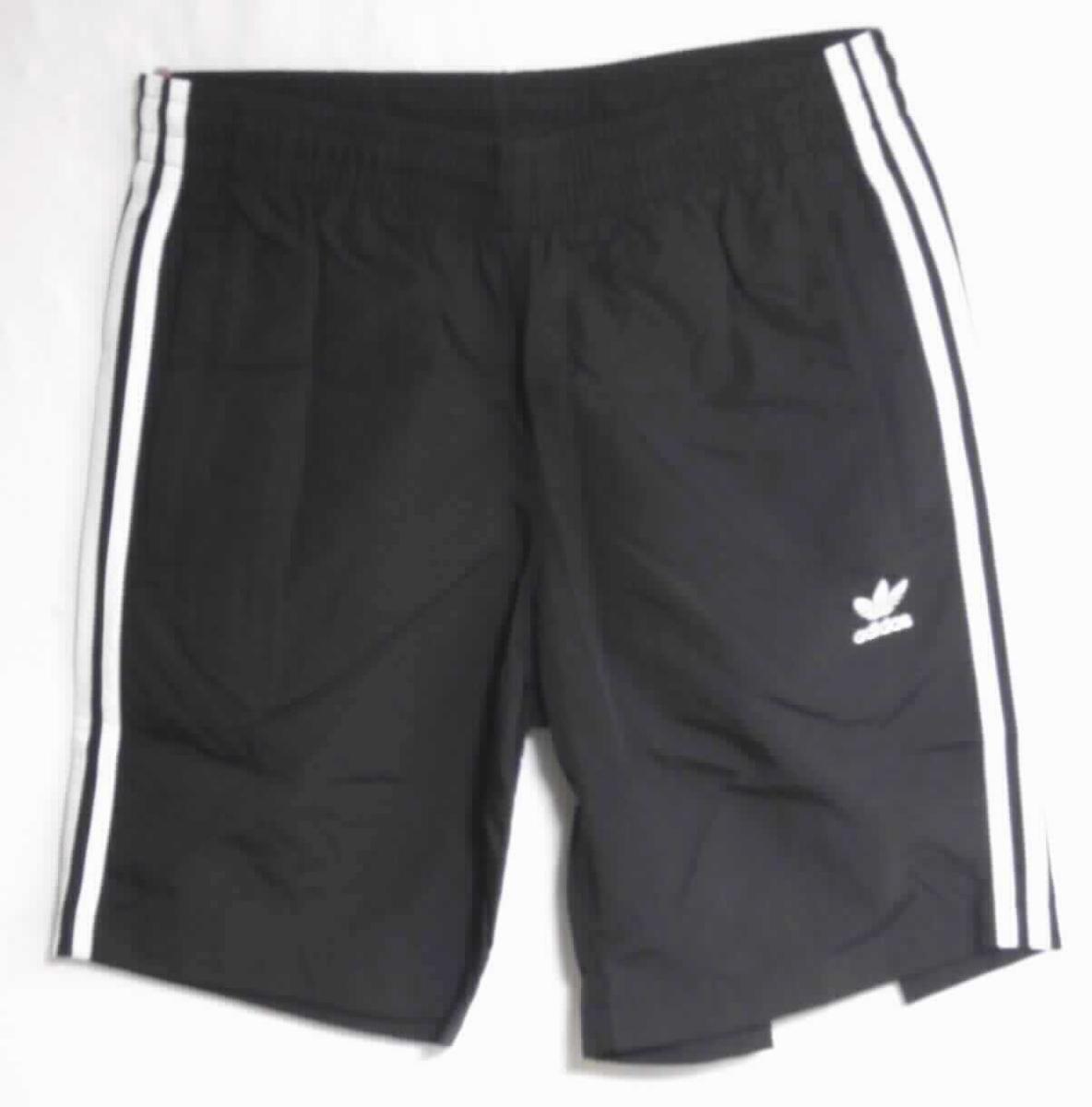 Badehose, sog. Adidas-Badehose 3-Stripes black, Größe M, Foto siehe Anlage,
- aus ca. 0,3 mm dicken, einfarbigen Geweben aus laut Antrag 100 % Polyamid (synthetische Chemiefasern),
- in der Taille abschließend; mit einem elastischen Taillenbund mit Tunnelzug,
- ohne Öffnung und ohne Verschluss, ohne Hinweise auf den Trägerkreis (unisex),
- mit kurzen Hosenbeinen,
- seitlich mit zwei eingesetzten Taschen unterhalb der Taille, mit Reißverschluss,
- mit einem eingenähten Innenslip, 
- an den Beinabschlüssen durch Umschlagen und Festnähen gesäumt,
- lässt nach Schnitt, Material und Ausstattung erkennen, dass sie dazu bestimmt ist, ausschließlich oder 
  hauptsächlich als Badekleidung getragen zu werden.

"Badehose, aus Geweben, für Frauen"