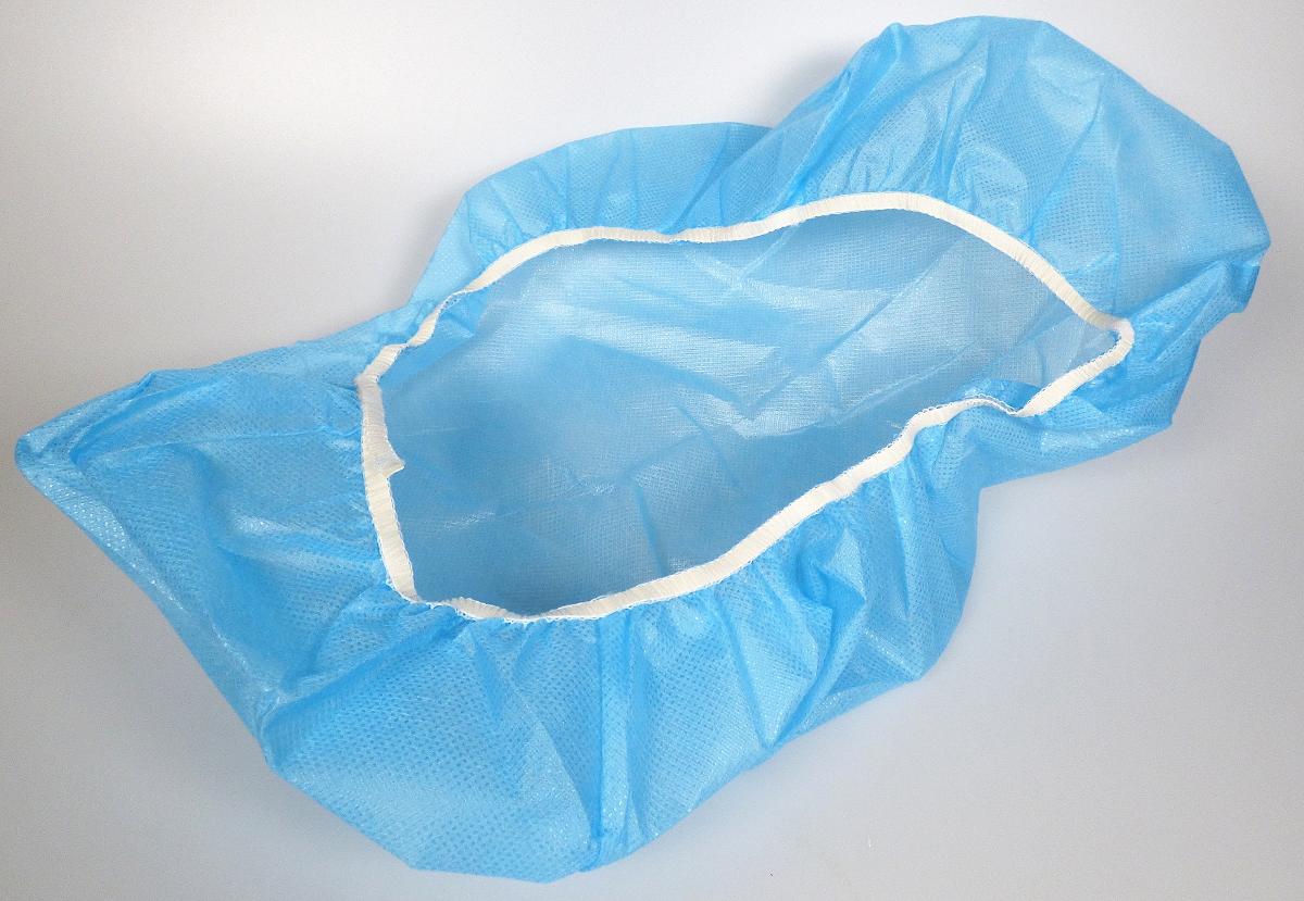 Hygieneschutz, sog. PP-PE Armstützenabdeckung, Foto siehe Anlage,
- flachliegend annähernd oval; laut Antrag in den Abmessungen von 44 cm x 18 cm x 8 cm,
- aus ca. 0,3 mm dicken, einfarbigen, einseitig (Innenseite) mit einer Kunststofffolie (kein Zellkunststoff;
  laut Antrag: Polyethylen) laminierten Vliesstoffen der Position 5603 aus laut Antrag Polypropylen (syn-
  thetische Chemiefasern),
- am Rand mit einem angenähten, elastischen Band verengt (u. a. dadurch konfektioniert),
- dient laut Antrag als Hygieneschutz für Armstützen von Behandlungsstühlen/-geräten.

"Andere Ware zur Innenausstattung (Hygieneschutz), aus Spinnstoffen, keine Ware der Position 9404,
 aus Vliesstoffen, aus synthetischen Chemiefasern"