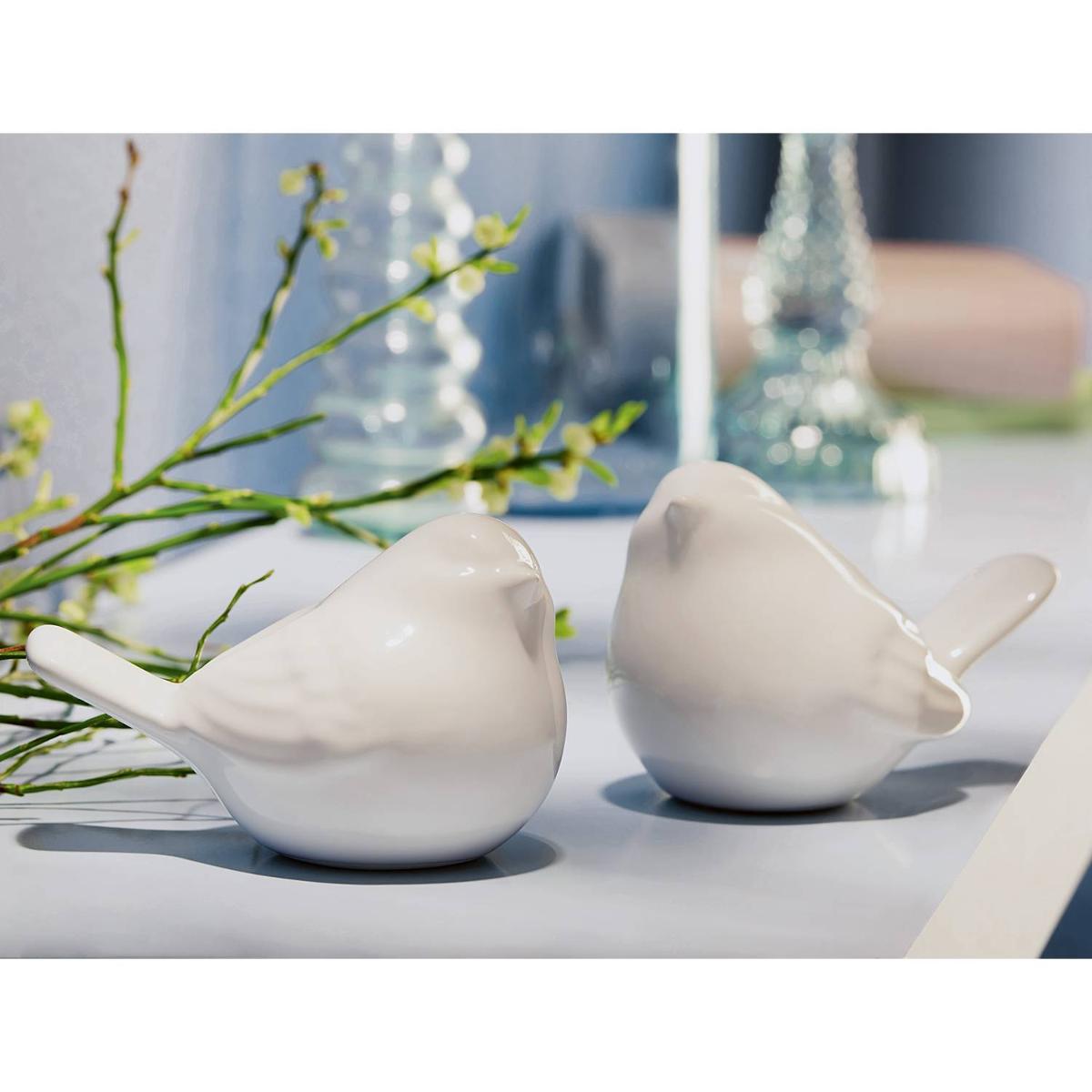 Andere keramische Ziergegenstände, sog. Figur Vogel, 2er Set,  Foto siehe Anlage,
- glasierte, weiße, innen hohle Vögel,
- in den Abmessungen: 7,1 cm (Höhe) x 10 cm (Länge) x 6,6 cm (Breite) bzw. 7,0 cm (Höhe)
  x 10,1 cm (Länge) x 6,3 cm (Breite), 
- keramische Erzeugnisse; nach der Formgebung gebrannt; tonmineralhaltiges Material enthaltend,
- nach dem Ergebnis der wissenschaftlichen Untersuchung aus Steingut,
- ohne Hinweise auf Handarbeit,
- in einem Karton verpackt.

"Andere keramische Ziergegenstände, aus Steingut, nicht handgearbeitet"