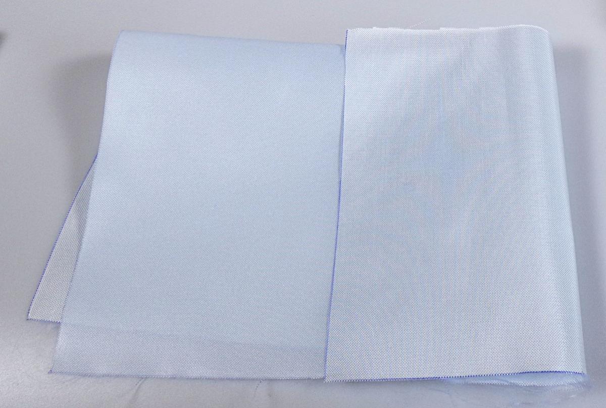 Erzeugnis des technischen Bedarfs, sog. Airbag Flachgewebe, Foto siehe Anlage,
- laut Antrag als Meterware, auf Rollen,
- aus Gewebe aus synthetischen Chemiefasern,
- einseitig mit Kunststoff (laut Antrag Silikon) bestrichen,
- wird laut Antrag zur Herstellung von Airbags verwendet,
- weist besondere Merkmale auf, die erkennen lassen, dass es sich um ein Erzeugnis des technischen
  Bedarfs handelt.

"Erzeugnis des technischen Bedarfs, aus Spinnstoffen, aufgeführt in Anmerkung 7 zu diesem Kapitel,
 Gewebe, mit anderen Stoffen als Kautschuk bestrichen, der zum Herstellen von Kratzengarnituren 
 verwendeten Art ähnliches Erzeugnis zu anderen technischen Zwecken"