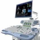 Medizinisches Elektrodiagnosegerät, Ultraschallgerät, sog. kardiovaskuläres Ultraschalldiagnosesystem Vivid 7 Dimension´06, im Wesentlichen bestehend aus 
- einem Monitor in zwei Ausführungen (17" CRT- oder 21" LCD-Monitor),
- einem ausziehbaren Bedienungsfeld mit alphanumerischer Tastatur, Reglern, Bedienknöpfen, Halterungen für Gel und Sonden, 2 Lautsprechern, einem Farb-Video-Drucker
- Schallkopf, der über Kabel mit dem Gerätewagen verbunden ist. Eine Ausstattung mit Sonden aus vier unterschiedlichen Schallkopftypen ist möglich: Phased-Array-Sektor, Linear-Array, Curved-Array (konvex) oder Continous-Wave-Doppler. (Unterschiede z. B. in Schallfläche und MHz-Frequenzbereich).
- Gerätewagen, mit integriertem Videorekorder, Schwarzweiß-Thermo-Videodrucker, Fach für CD-Rom und magnetooptische Platte, Sondenanschlüssen, Schwenkverriegelung und Bremsen für Räder. Gesamtmaße: 157,5 cm H x 64 cm B x 90 cm T, Gewicht: 190 kg.
Das Gerät dient insbesondere zur Herz- und Gefäßuntersuchung mit mehrdimensionaler Darstellung der Organstrukturen, der Herzfunktion und der Darstellung der Blutflussrichtung.  
Die einzelnen Komponenten sind über Kabel miteinander verbunden und stellen eine funktionelle Einheit dar. Die Ware ist in einem Karton auf einer Palette verpackt.
Ein Bild der Ware ist unter http://europa.eu.int/comm/taxation_customs/dds/de/ebticau.htm zu finden.