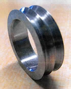 Sog. Labyrinthring (Innenring),
- in Form eines Ringes aus Stahl mit glatter Innenseite und einer an der Außenseite um-
  laufenden W-förmigen Doppel-Nut (Innendurchmesser 19,5 mm, Außendurchmesser
  25,8 mm) - Abbildung siehe Anlage -,
- zur Verwendung als Innenring eines Radialwellendichtrings, der in unterschiedlichen Be-
  reichen des Maschinen- und Gerätebaus zur berührungslosen Abdichtung von Maschinen-
  gehäusen gegen rotierende Maschinenelemente (z. B. Wellen) eingesetzt wird.

"Nichtelektrischer Teil von Maschinen, Apparaten und Geräten, in Kapitel 84 anderweit weder genannt noch inbegriffen, keine Ware der Unterpositionen 8487 1010 00 bis 8487 9059 10 - sog. Labyrinthring"