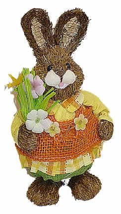 "Osterhasenfrau mit Blumen",
- ca. 37 cm hohe Nachbildung eines aufrecht stehenden Hasen, einen Blumenstrauß in
  der Pfote haltend, mit Papier beklebtem Korpus aus Styropor (ohne eigene zierende
  Wirkung), 
- Kopf, Ohren (teilweise) sowie Pfoten mit kurzen, nicht zum Flechten geeigneten Gräsern
  beklebt, Oberkörper mit Bluse, Schürze und stilisiertem Rock aus Spinnstoffen bekleidet, 
- mit aufgeklebten Augen aus Kunststoff, Mund aus Papier sowie Nase aus Spinnstoff und
  pflanzlichem Material,
- Ohreninnenseite mit Jutegewebe versehen,
- weist keinen eindeutigen Bezug zum Osterfest auf,
- zu Dekorationszwecken,
- wird üblicherweise auch vom Blumenhandel zu Zierzwecken angeboten.
 (Abbildung siehe Anlage)
Der Charakter der Hasenfigur wird durch die Pflanzenteile bestimmt.

"Ziergegenstand aus getrockneten, blütenlosen Pflanzenteilen (andere als Moose und 
 Flechten), weitergehend bearbeitet als nur getrocknet, nicht zur Herstellung von Potpourries 
 (zusammengesetzte Ware aus Pflanzenteilen -charakterbestimmend-, Spinnstoff, 
 Papier und Kunststoff), sog. Osterhasenfrau mit Blumen"