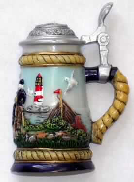 Magnet-Notizhalter (Abbildung siehe Anlage),
- aus einem Dauermagneten aus agglomeriertem Ferrit und der Nachbildung eines halben
  Bierkruges aus Kunststoff (Polyresin),
- zur Befestigung von Notizzetteln auf Metallunterlagen bestimmt,
- mit dem Magneten als charakterverleihendem Bestandteil im Hinblick auf die Verwendung.

"Dauermagnet aus agglomeriertem Ferrit, nicht für bestimmte Luftfahrzeuge, 
zusammengesetzte Ware aus Magnet (charakterbestimmend) und Nachbildung eines 
halben Bierkruges aus Kunststoff"