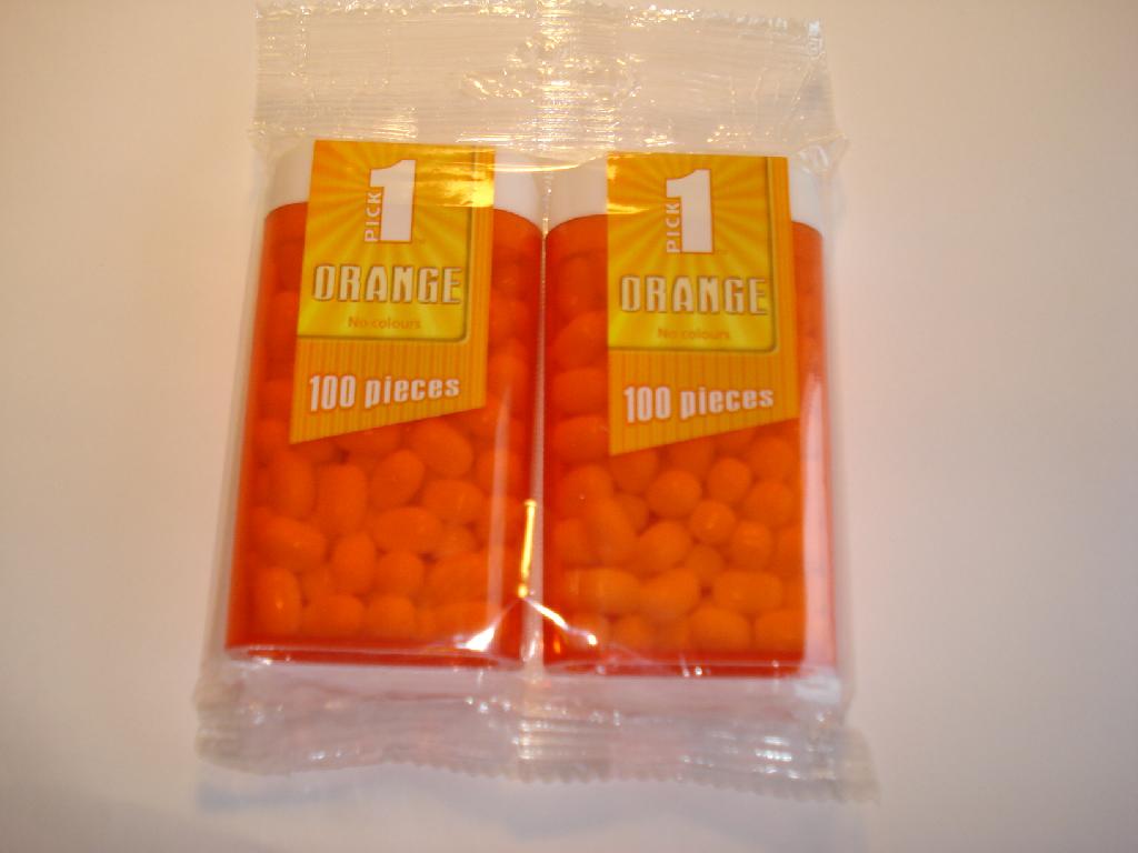 Varen fremstår som små, ovalformede pastiller (ca. 1 x 0,5 x 0,5 cm) med kraftig smag af appelsin. Pastillerne har yderst en hård, hvid skal uden smag af appelsinpebermynte. 
Varen er pakket 100 styk i plastbeholder (4,5 x 8,5 cm). To plastbeholder er pakket sammen til detailsalg. 
Analyse har givet følgende resultat: Protein < 0,1 %, Saccharose og invertsukker 2,5 %, Stivelse/glucose 82,5 %, Lactose ej påvist