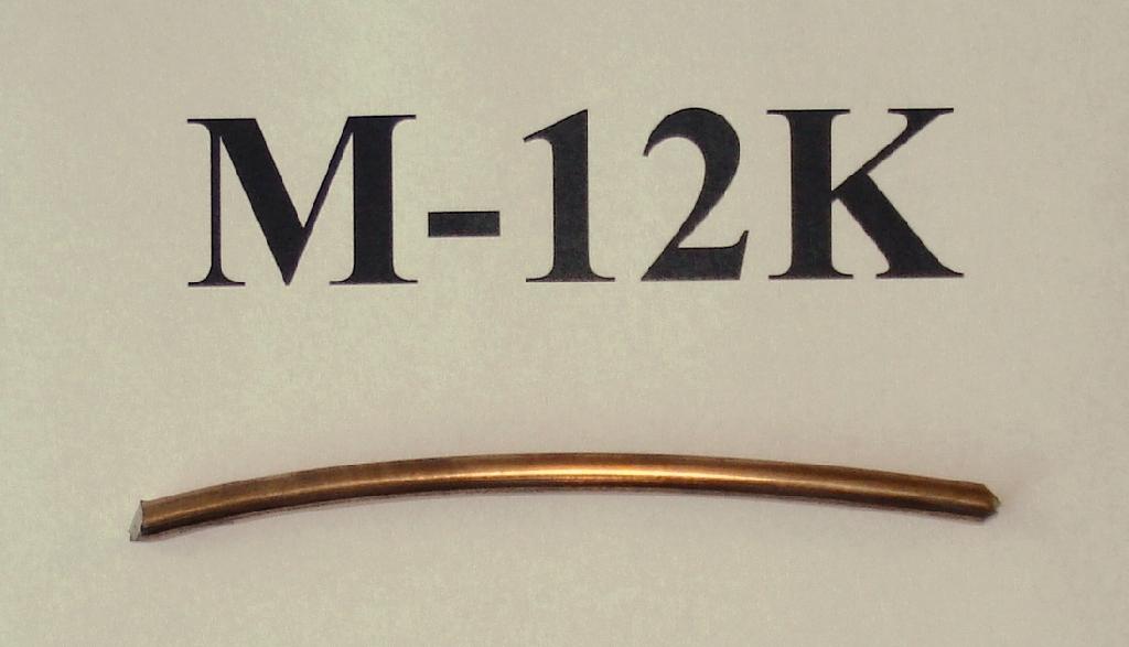 Produktet er en tråd med diameter på 3,0 mm til 4,0 mm, der består af en kerne af jern med nogle få andre legeringsmaterialer. Kernen er overtrukket med et tyndt lag kobber, således at produktet fremstår som en kobbertråd.

Produktet er beregnet til at anvendes som en svejsetråd.
