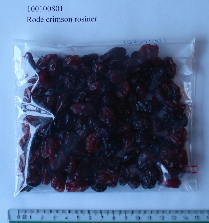 99,3% Crimson rosiner, solsikkeolie, konserveringsmiddel; E220 (svovldioxid)

Produktet fremstår som mørkerøde rosiner i varierende størrelser omkring 2 cm., som har bevaret karakteren af tørrede frugter.