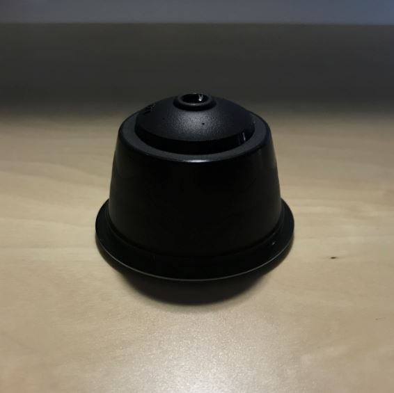 Kaffen er kommet i kapsler af plastik og skal anvendes som espresso kaffe i en speciel kaffemaskine. Kapslerne er pakket i en karton, der indeholder 16 kapsler (detailsalgspakning) af 6 gram.
Varen består ifølge det oplyste af kværnede og ristede kaffebønner (100 % Arabica bønner). Varen indeholder koffein.