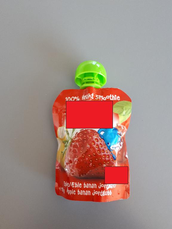Varen foreligger som en fin, ensartet og homogen brun-orange mos uden frugtstykker. 
Den dufter af æble, banan og lidt af jordbær. Varen smager af sød banan og lidt af æble og jordbær. Varens konsistens gør, at den flyder lidt ud på en ske. Det er dog muligt at spise varen med en ske, da den ikke er så flydende, at den er svær at håndtere på en ske. Varen kan også spises direkte fra posen ved, at klemme indholdet ud i munden.
Varen er efter det oplyste beregnet som børnemad til børn fra 6 måneder.
Ifølge ingredienslisten på emballagen indeholder varen følgende:
æblepuré, bananpuré, jordbærpuré, samt vitamin C.

Produktspecifikationen angiver følgende ingredienser:
æblepuré, bananpuré, jordbærpuré og ascorbinsyre.

Næringstabellen angiver følgende: 
fedt, kulhydrater, heraf også sukkerarter, kostfibre og protein.
Varen foreligger i detailsalgsemballage.