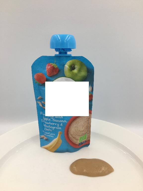 Varen fremstår som børnemad bestående af en homogen masse af frugtpuré og havre. Puréen har en gullig/brun farve, og smagen af æble og banan trænger mest igennem.
Produktet er ifølge det oplyste beregnet som et mellemmåltid til børn fra 6 måneders alderen. Det kan spises direkte fra posen eller med ske.
Det er oplyst, at varen består af æble, banan, jordbær og fuldkornshavremel.
Varen forekommer i detailsalgsemballage på 110 gram.