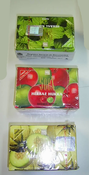 Producto destinado a fumarse en pipa de agua constituido en su totalidad por sustancias distintas al tabaco (melazas de hierbas aromáticas, glicerina, aromas etc.) sin nicotina ni alquitrán. Se presenta, con diferentes sabores, en bolsas de plástico envasadas en cajas de cartón, juntamente con 4 boquillas para pipa, con 50 gramos de contenido. También se presenta en envases de 250 gramos.