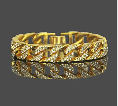Pulsera de oro de 18K sobre la que van montadas piedras preciosas con un peso total de 9.5qts.
Peso total: 75g.