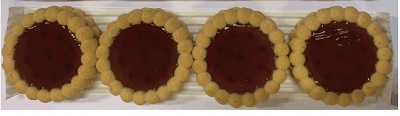 Tartaleta redonda rellena de fresa. Tartas redondas con borde festoneado e interior liso con hendiduras en las puntas de los cilindros. El interior está relleno de cobertura de fresa. Se presenta en paquetes de 150 gramos con 8 galletas en su interior. El contenido en peso de sacarosa, azúcar invertido y/o isoglucosa es superior al 5%, en peso.
Concebido para uso alimentario.