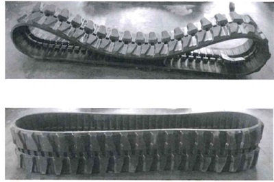 Orugas de caucho (no celular vulcanizado y sin endurecer) y metal para excavadoras y mini excavadoras. El caucho constituye el material exterior y es el predominante en peso.
Se presentan sin embalar con unas dimensiones aproximadas de 400 mm de ancho y 2.560 mm de largo.