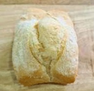 Pan tipo chapata. Producto de panadería sin gluten. Se presenta en paquetes de dos unidades de 80 gramos cada una. Contenido de sacarosa, azúcar invertido y/o isoglucosa y de materias grasas calculado sobre la materia seca inferior al 5% en peso. Envase de polipropileno biorientado. Envase de polipropileno biorientado. Cajas de 12 paquetes con un peso de 1920 gramos.
Concebido para uso alimentario.