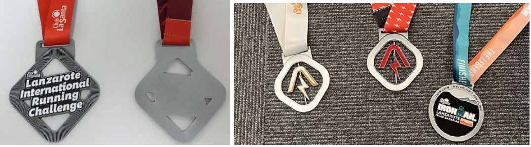 Artículos en forma de medallas de metal común (aleación de zinc) fabricadas por fundición, no chapadas de metal precioso. Presentan forma circular o romboidal, con diferentes medidas, entre 80 y 85 mm de diámetro. En la parte superior presentan una ranura o asa de 4 mm para insertar la cinta de sujeción y colgar del cuello. 
El artículo puede estar decorado con diseños diversos estampados y de distintos colores.
Las medallas se presentan con la cinta para colgar al cuello.
El artículo se presenta para su uso como medalla, a fin de servir de adorno personal para celebrar el éxito en un concurso o competición.